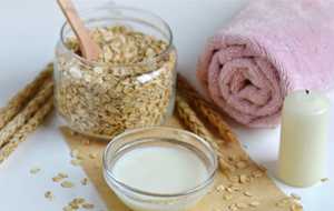 Mix oatmeal with milk and honey to form a paste