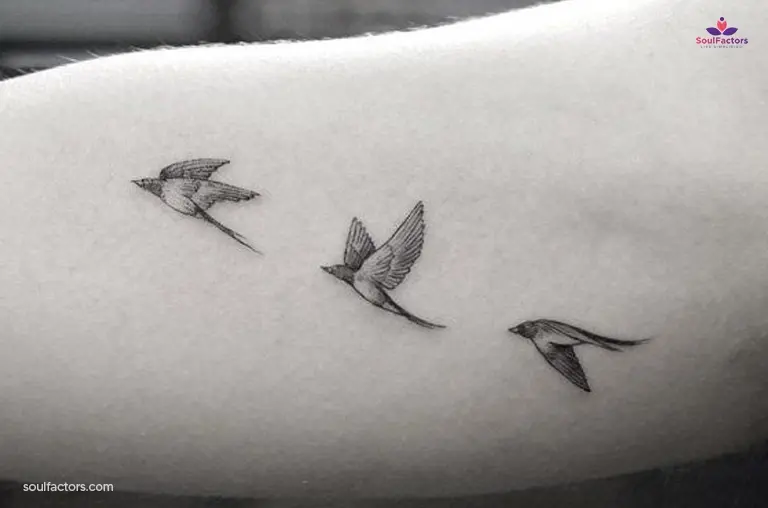 Birds in flight tattoo