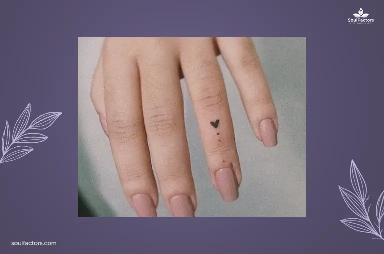 Miniature Symbol Finger Tattoo Idea