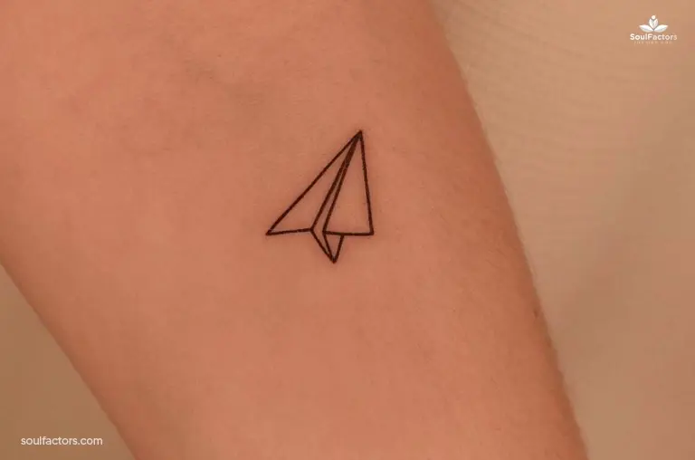 paper-airplane small tattoo
