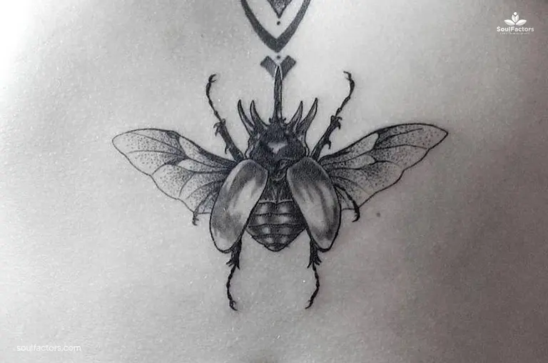 Bug Sternum Tattoo