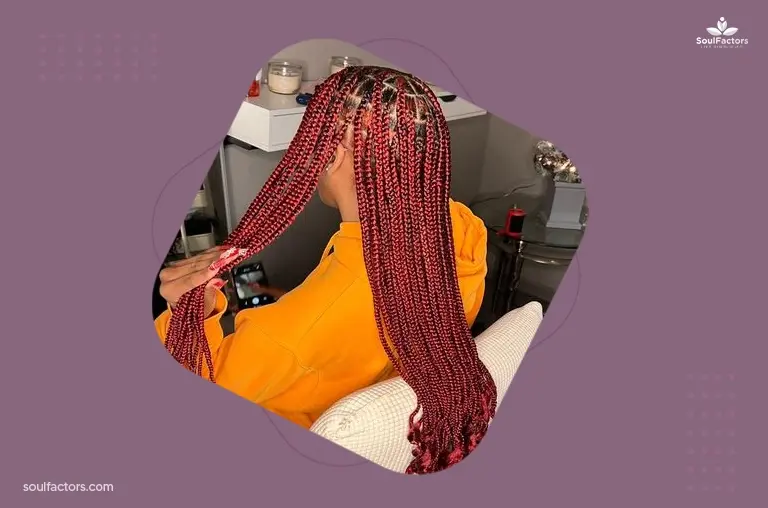 Burgundy knotless braid with curly ends 