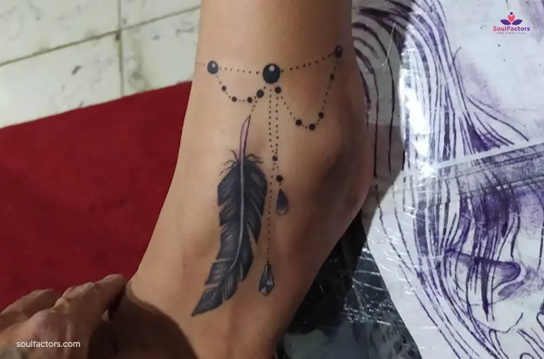Feather Charm Ankle Tattoo 